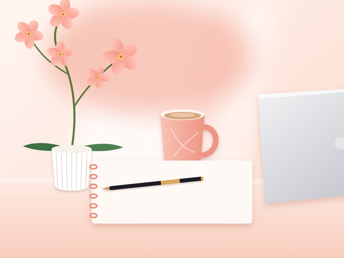 A desk with an orchid, a mug, a notebook and a laptop